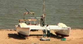 Skua on beach being rigged